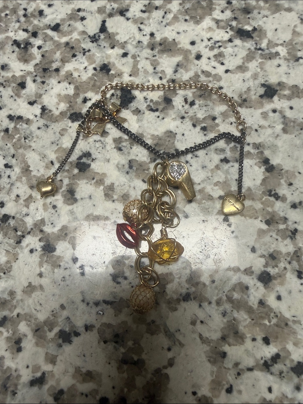 Gold Tone Heart and Charm Drop Bracelet with Red and Yellow Accents